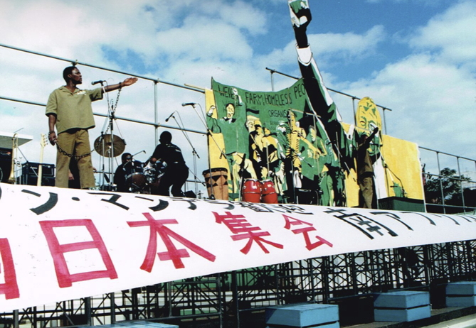 _ Members of Amandla on stage, re-enacting Mandela’s 1964 speech (“I am prepared to die”) to the South African court that sentenced him to life in prison. He was now free after 27 years.  _ Members of Amandla on stage, re-enacting Mandela’s 1964 speech (“I am prepared to die”) to the South African court that sentenced him to life in prison. He was now free after 27 years.