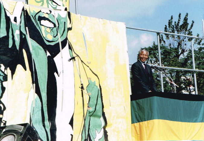 _ Mandela the symbol and Mandela the man, on the same stage together in Osaka, after many months of arduous planning by local organizers in the Kansai area of Japan.  _ Mandela the symbol and Mandela the man, on the same stage together in Osaka, after many months of arduous planning by local organizers in the Kansai area of Japan.
