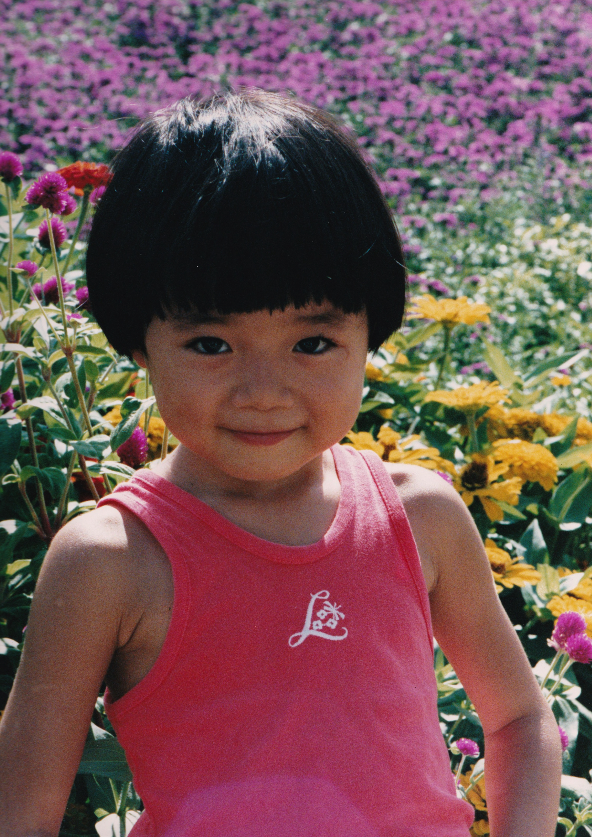 _ The blossoming spirit of Flower Expo ’90, the first major international gardening exposition in Asia, is caught by Risa, a Japanese youngster attending the event with her family. Expo ’90 site, Tsurumi ward, Osaka.  _ The blossoming spirit of Flower Expo ’90, the first major international gardening exposition in Asia, is caught by Risa, a Japanese youngster attending the event with her family. Expo ’90 site, Tsurumi ward, Osaka.